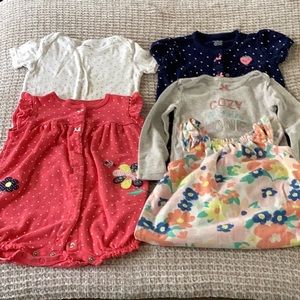 Bundle of onesies from Carter’s size 24 months all different designs